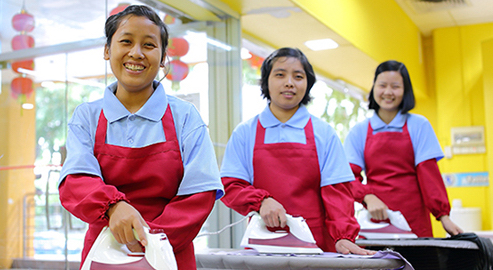 Maids doing housekeeping jobs